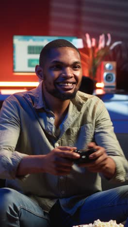 vertical video cheerful confident person winning the video games championship