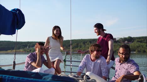 friends enjoying a day on a yacht