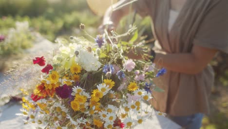 Tying-flowers-in-the-meadow