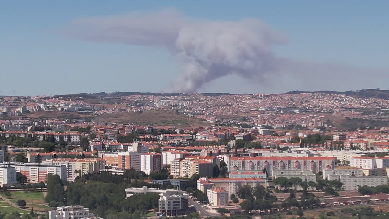 Shot  of the Lisbon City Fire event from a distance. visible clouds of smoke