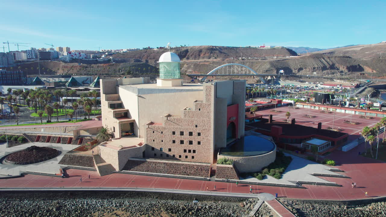 Aerial Journey over Alfredo Kraus Auditorium in Las Palmas de Gran Canaria on a Bright Day.