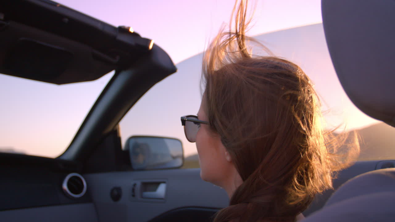 Female Passenger Driving In Convertible Car Shot On R3D