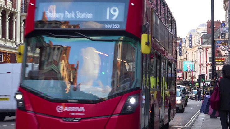 Double decker bus passing through the London theater district