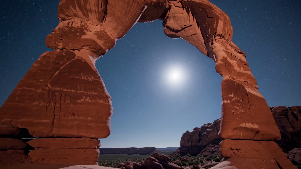 Delicate Arch at Night Under the Stars and Moon