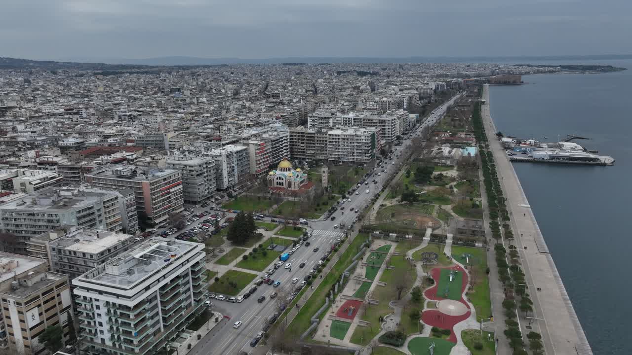 Thessaloniki with the Cyril and Methodius church in the frame, aerial view. People commuting