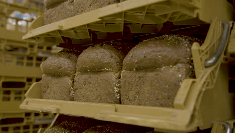 dark bread stacked in storage baskets