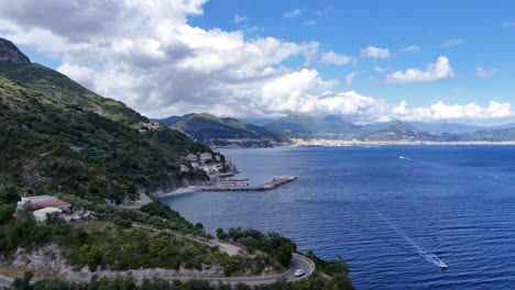 Aerial-View-Over-Amalfi-Coast-Surrounded-By-The-Tyrrhenian-Sea,-Mountains,-and-Lush-Vegetation,-Italy,-Europe