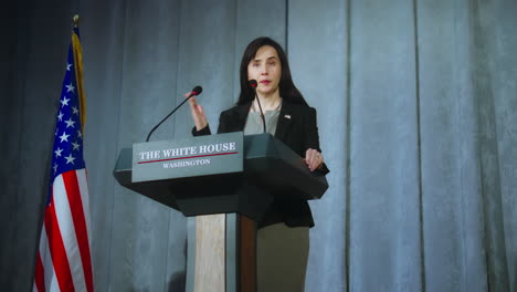 woman giving a speech at a white house event