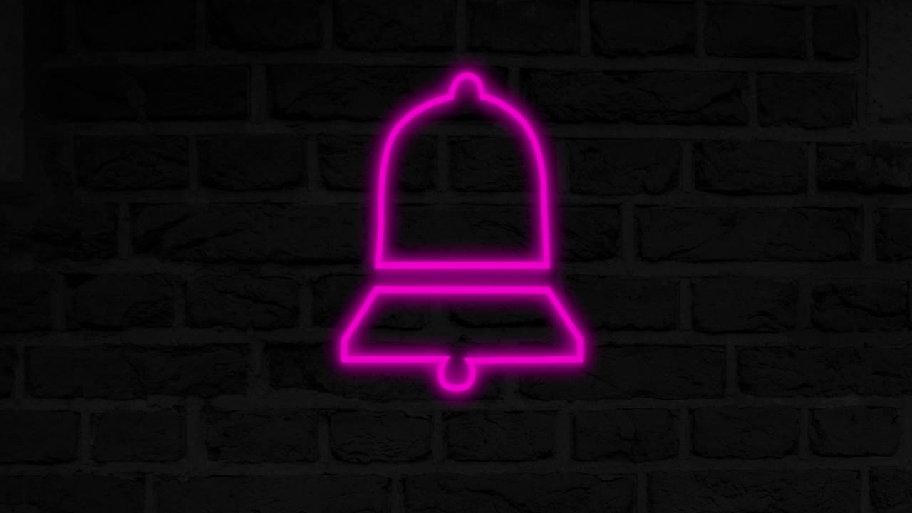 벽돌 벽 4k에 네온 표지판을 내려 놓습니다.