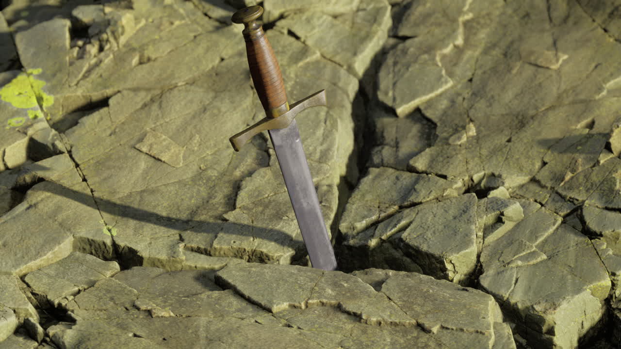 espada incrustada en el suelo rocoso durante el día en un paisaje sereno