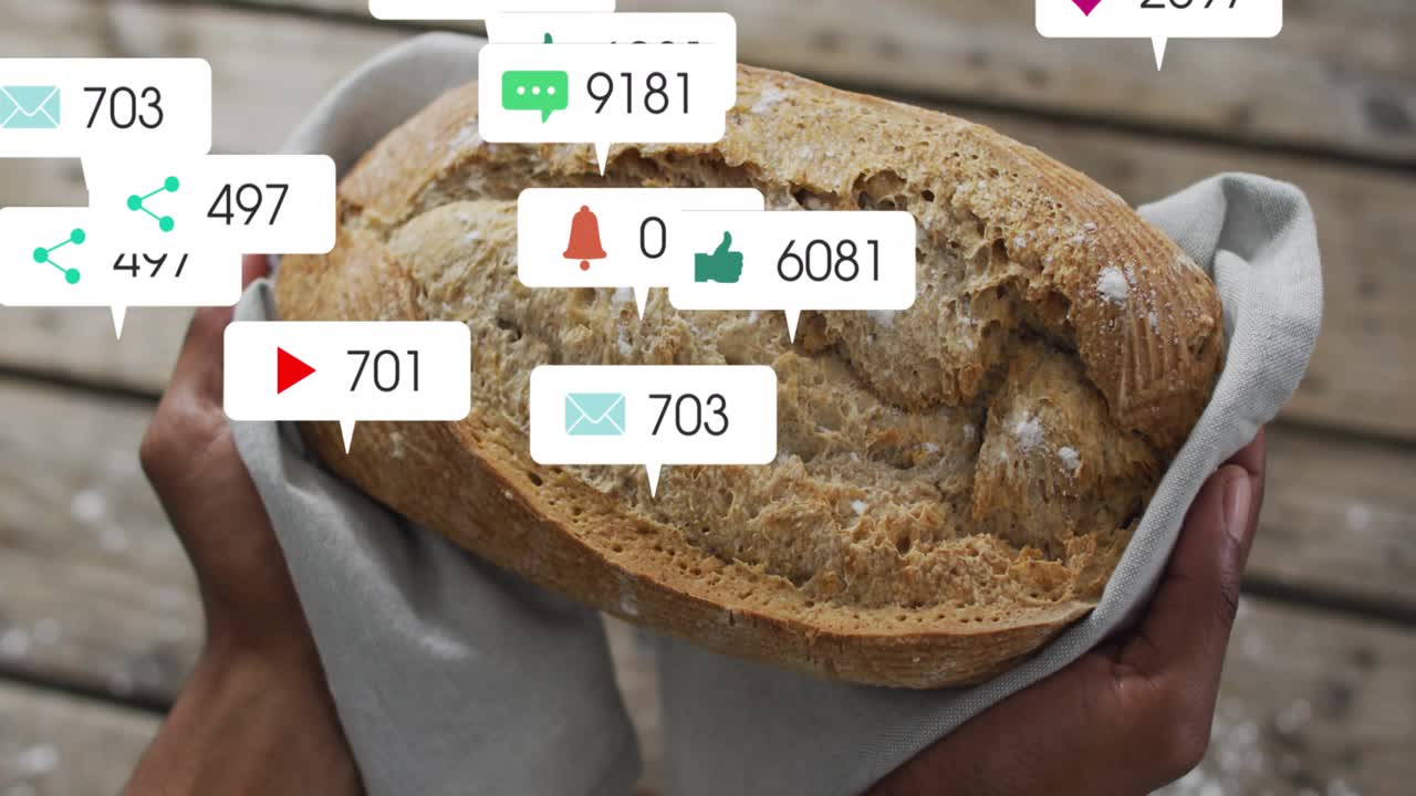 Man holding artisan loaf after stillness generating marketing social icons popping up rising counts