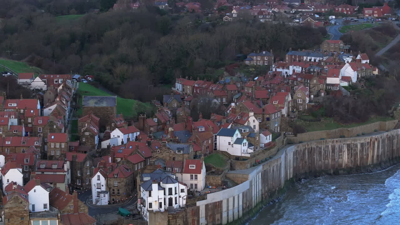 Pullback Establishing Drone Shot of Robin Hood's Bay at Low Tide UK