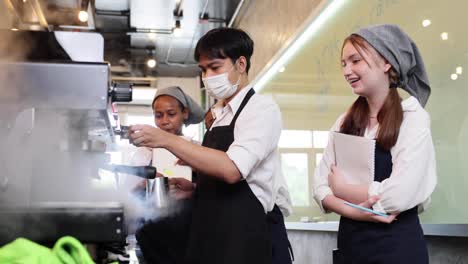 barista learning make coffee by espresso machine. group schoolgirl studying hard to learn how to make espresso coffee at barista school.