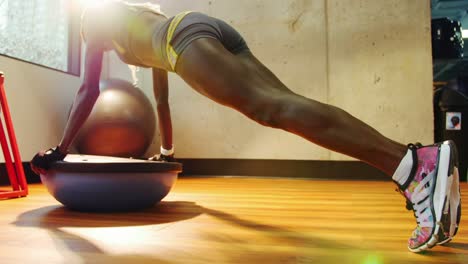 Fit-woman-exercising-in-gym