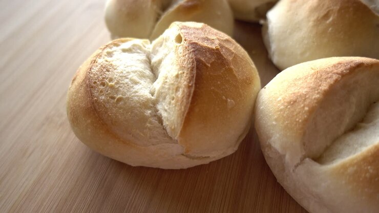 Bread on Wooden Background Rotates