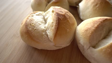 bread on wooden background rotates