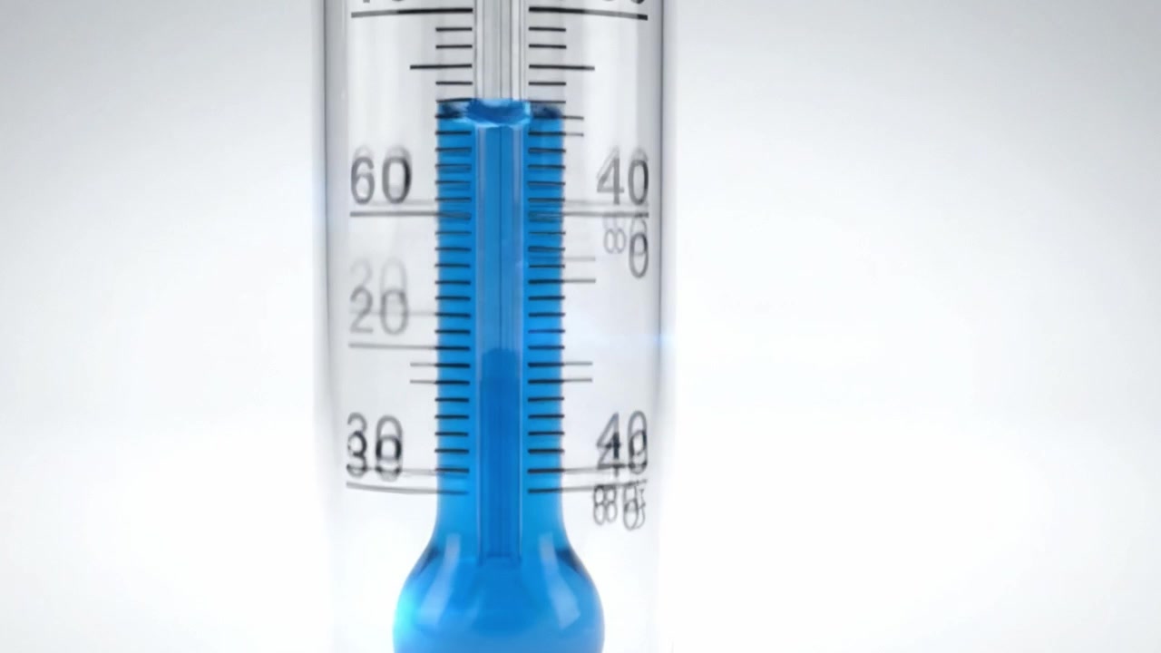 Una chiara rappresentazione visiva della misurazione della temperatura tramite un termometro: focalizzata su precisione e chiarezza con un indicatore a liquido blu