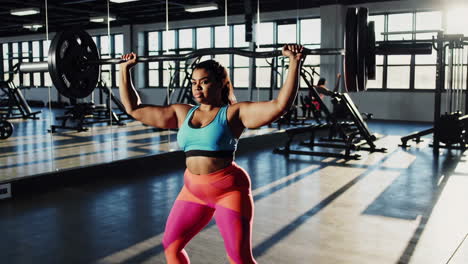 plus-size woman weightlifting in a gym