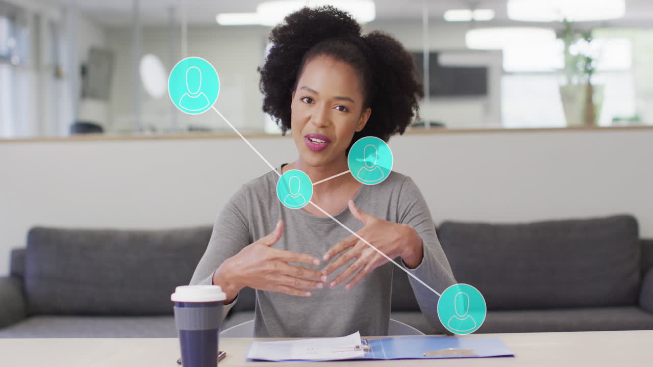 Animation of network and data processing over african american businesswoman in office