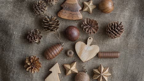 rustic wooden christmas ornaments on burlap