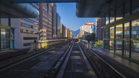 4k time lapse of monorail pass the city in taipei city in taiwan