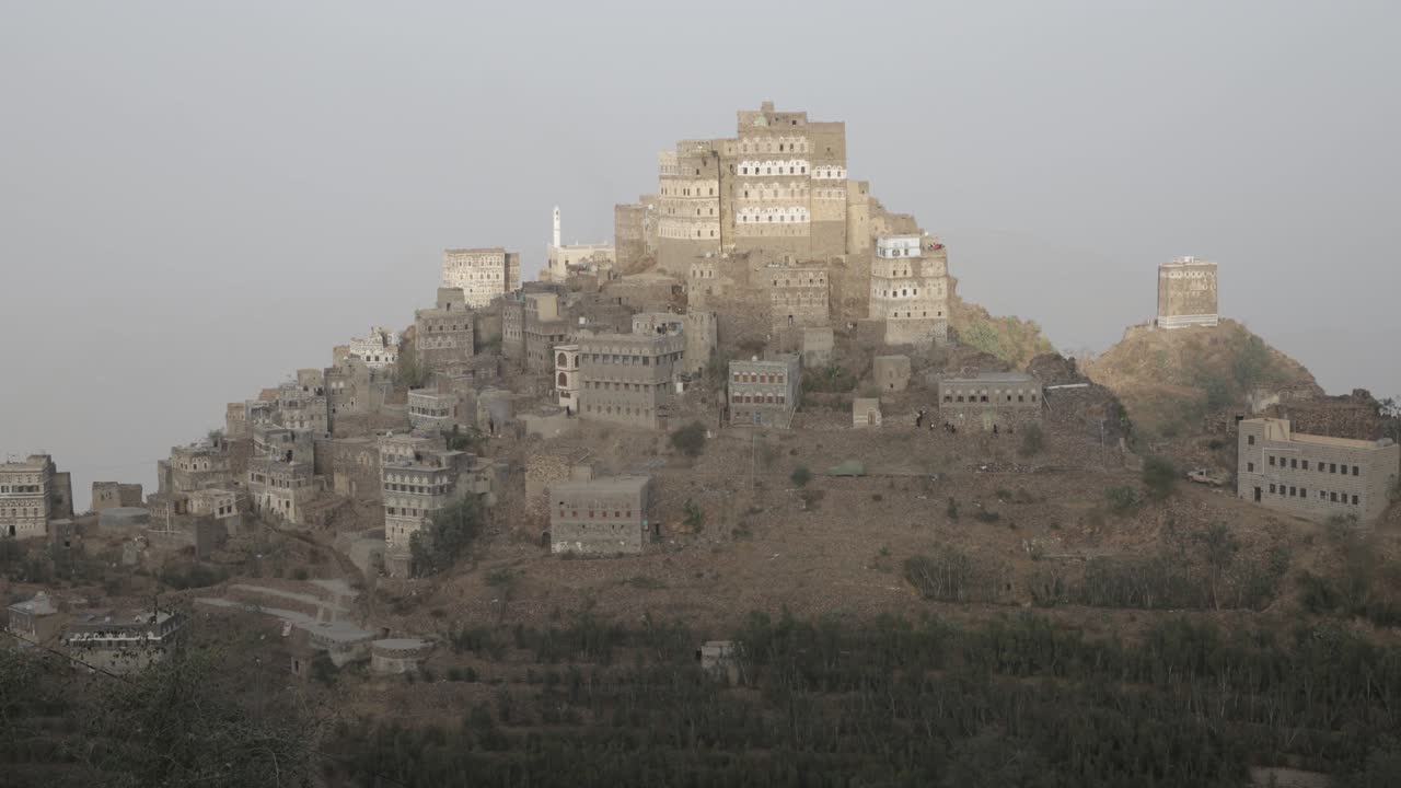 timelaps in Haraz Yemen during sunrise with people start doing their daily work like ants