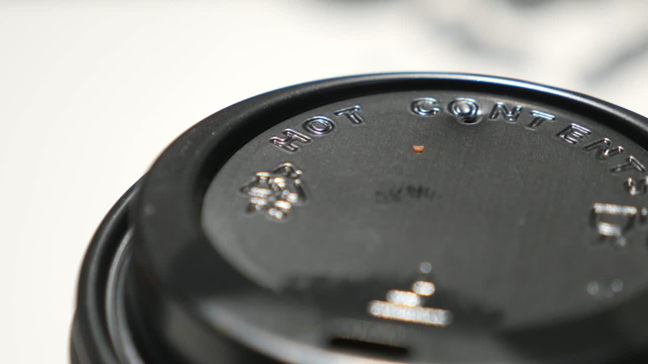 Close Up of a Coffee Cup Lid