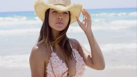 Gorgeous-young-sunbather-wears-straw-hat