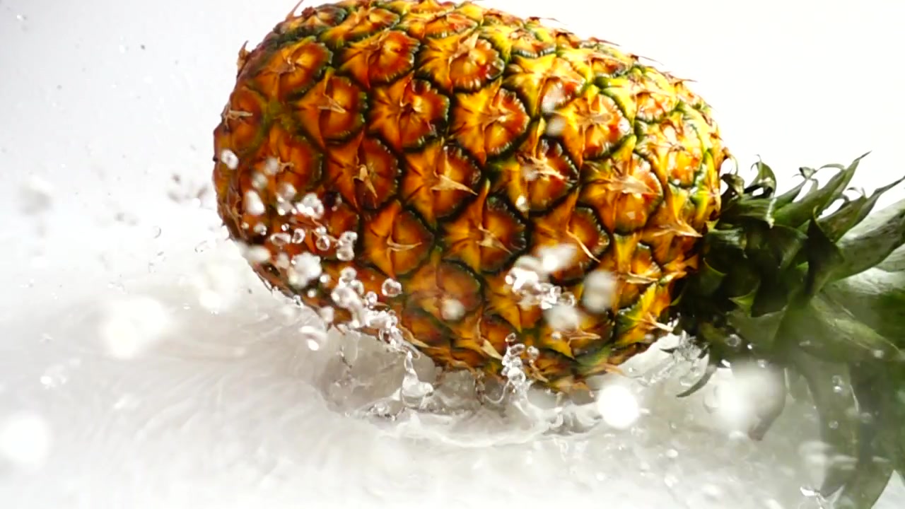Fresh ripe pineapple. Slow motion.