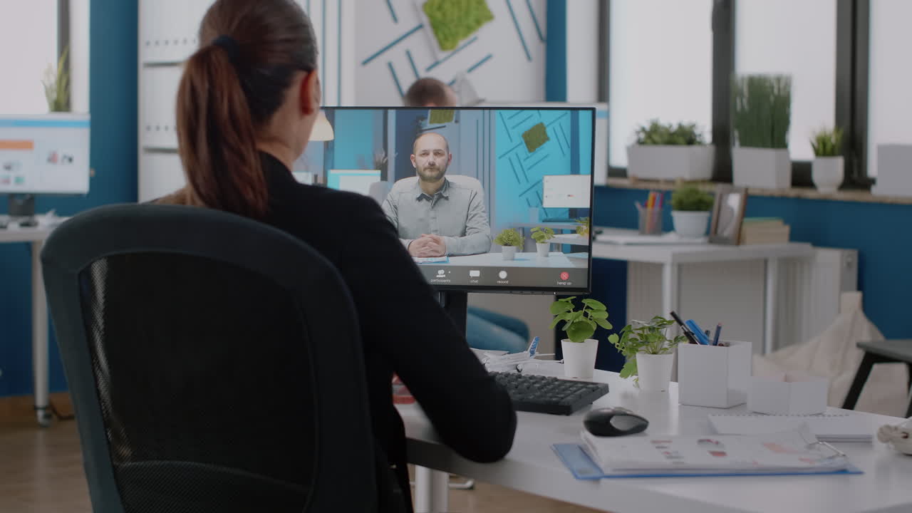 Businesswoman using video call on computer for conversation