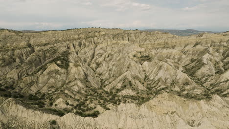 eroded sandstone canyone with sharp ravines in vashlovani, georgia