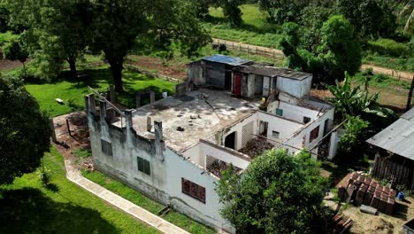 aerial view over the ruins of an abandoned house