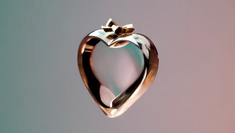golden heart with bow on gradient background