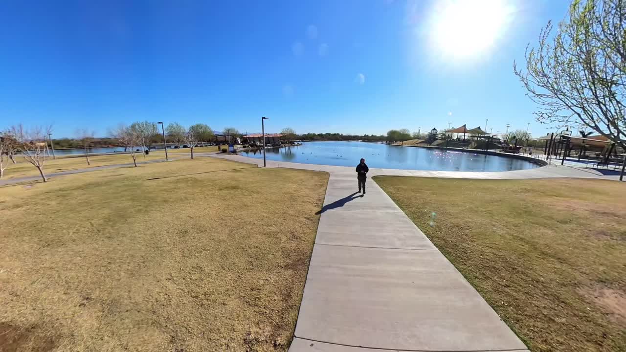 Red haired male walking in Mansel Crater Park in Queen Creek Arizona.
