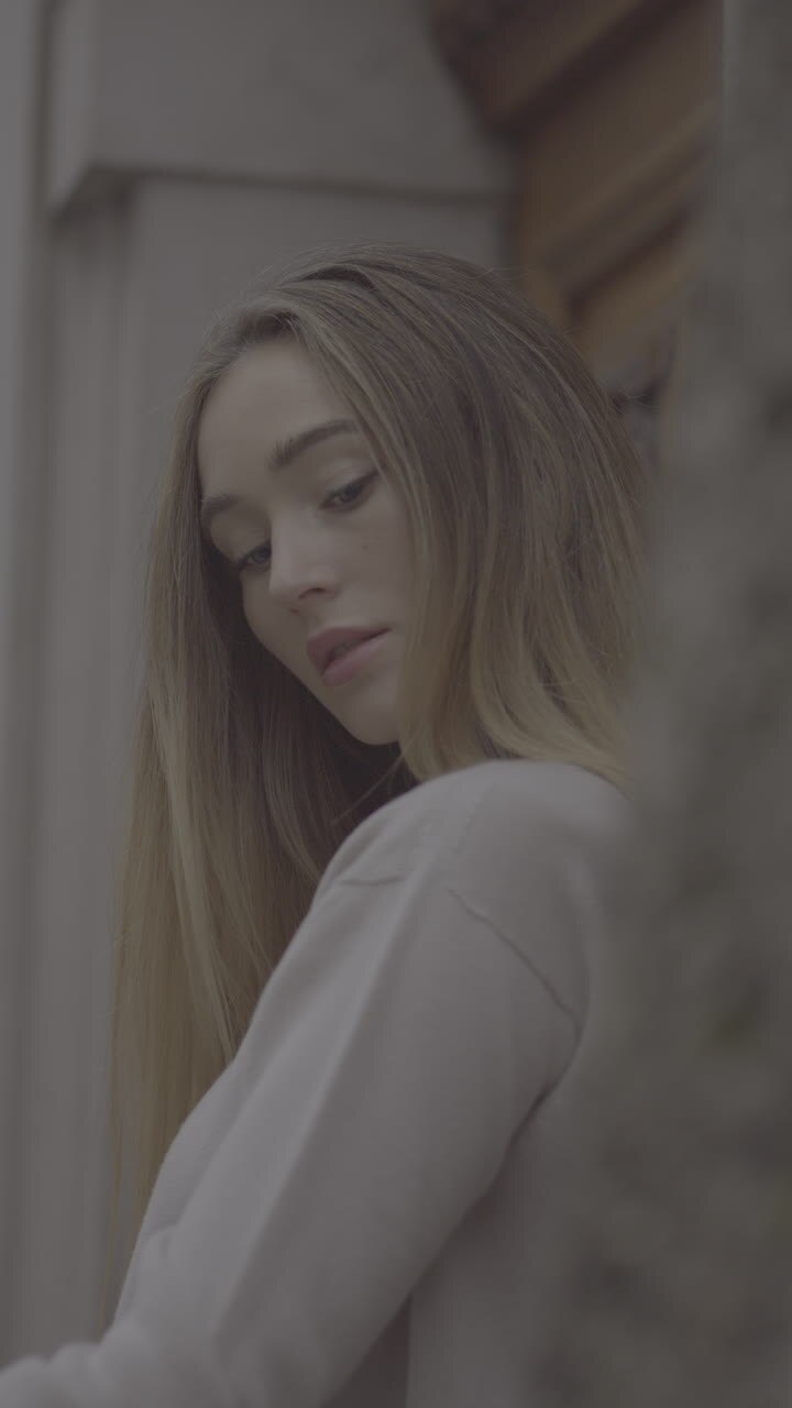 Portrait of a Woman in a Beige Turtleneck