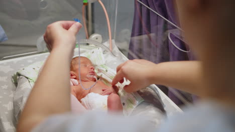 infant in hospital nursery