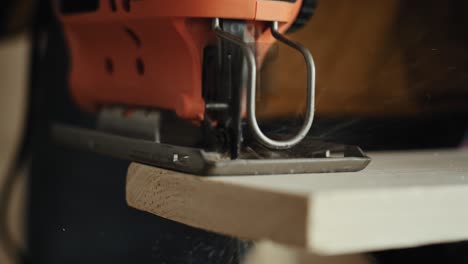 detail video of sawing wood with an electric jigsaw