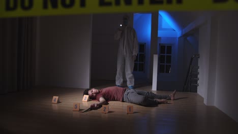 forensic expert working on a crime scene