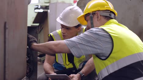 skilled maintenance supervisor is training the engineers on the team.