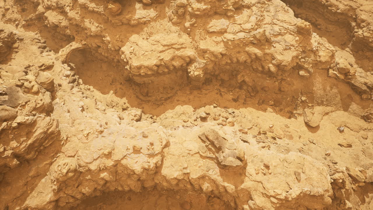 Exploring sandy terrain with rock formations in sunny desert environment