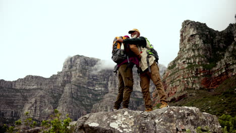 senior men hiking in the mountains