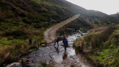 mother and son walking on the yorkshire moorlands in the english countryside