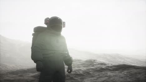 astronaut on another planet with dust and fog