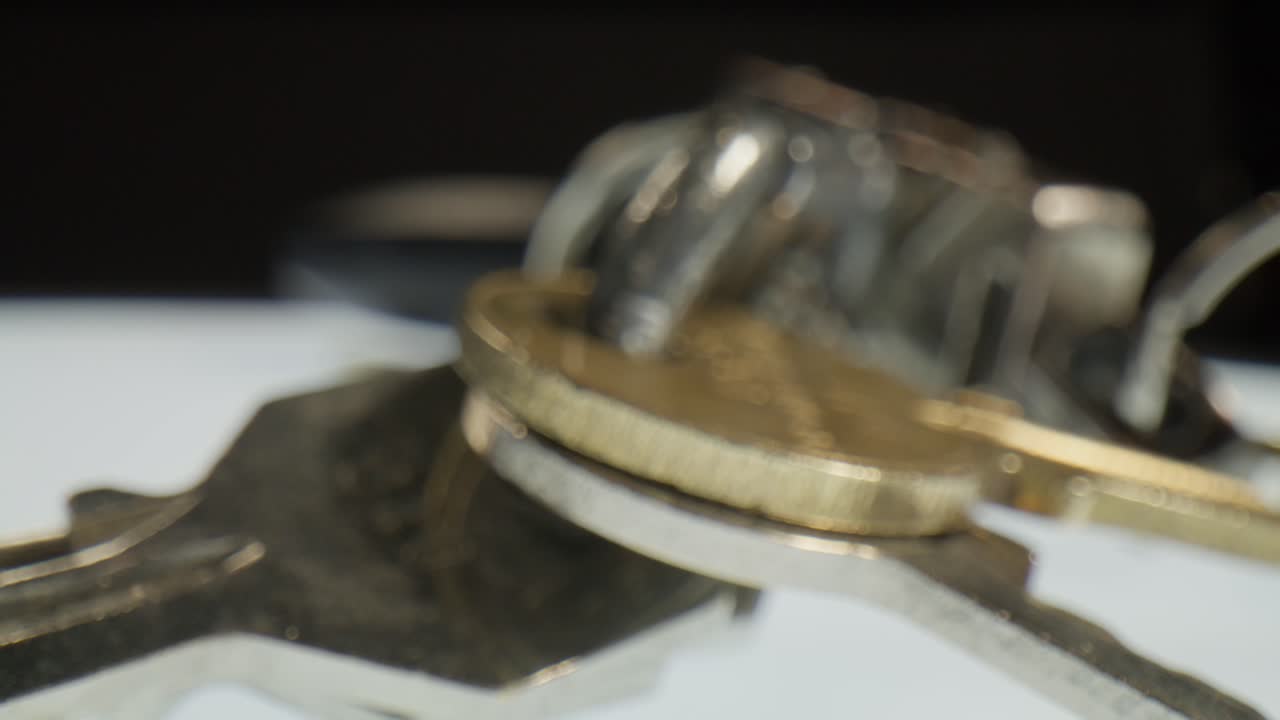 Set of keys with macro video close up moving in a circle.