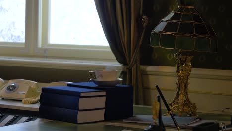 elegant office interior with tea and books