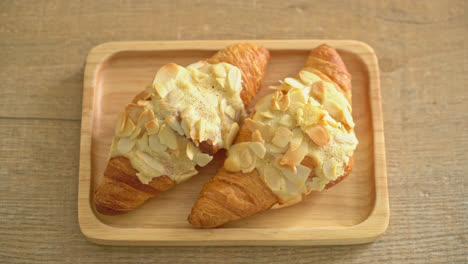 croissant with cream and almonds