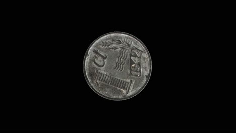netherlands 1 cent 1942 reverse showing denomination with an ear of corn, macro loop on black background