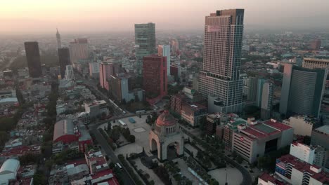 Aerial-Drone-Tracking-Orbit---Monument-to-the-Revolution---Plaza-de-la-República---Mexico-City,-Mexico---Sunset-Sunrise