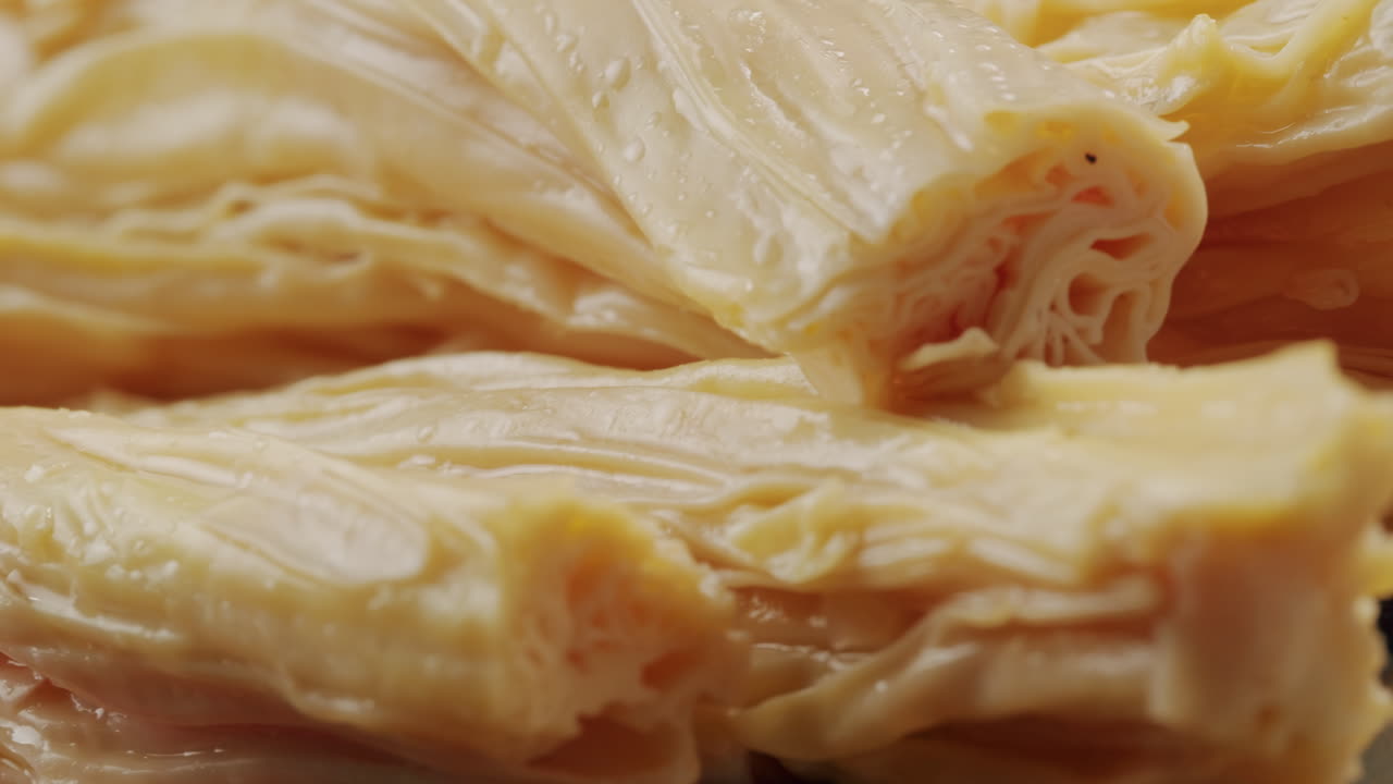 Fermented soy food Fuzhou, Tofu skin yuba sticks or Fuzhu on plate. Healthy asian soy food, Korean and Chinese cuisine.