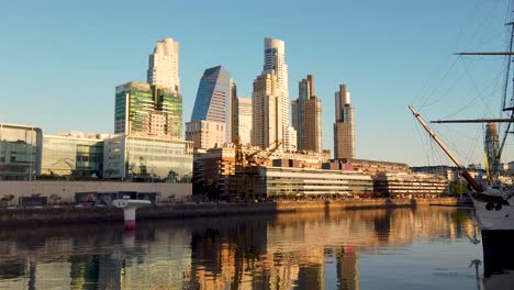 waterfront skyscrapers of puerto madero, buenos aires panoramic cityscape at sunset